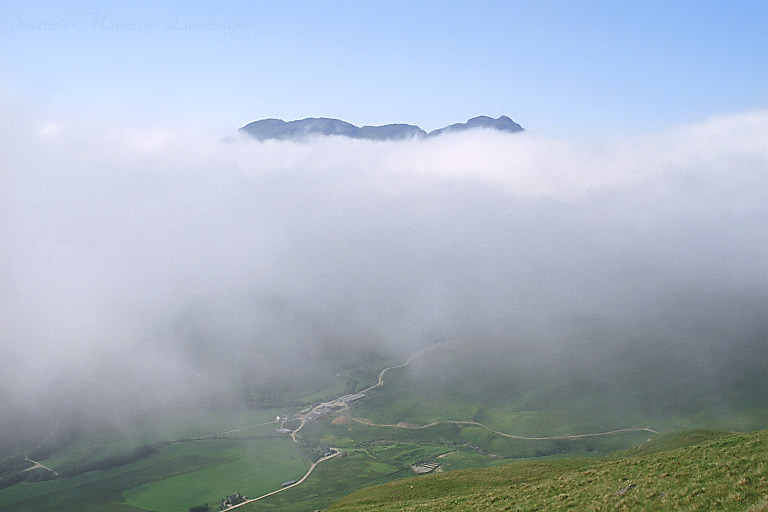 The summit of Stob a'Choin above the clouds, from Stob Invercarnaig.